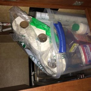 This is the cupboard under the pantry.  We store toilet chemicals, toilet paper and a few other things we don't reach for all that often.  A Sterlite 