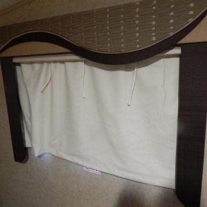 Black out curtain in bedroom, original shade is up.