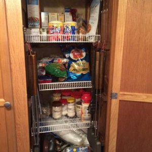 The closet was a big open space that we would never fully use as a closet so we decided to split it in half making a pantry. Cut 20" deep wire shelf a