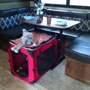 When we're not entertaining, the dog's kennel will go here. (His "Ellie," a toy elephant with squeakers in its feet, is sitting on top.)