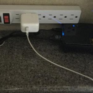 HDMI and power strip by dinette TV