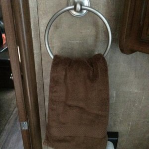 Replaced cheesy bathroom hand towel hook with a nice towel ring.