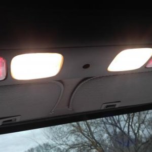 Installed used over head console with red LED map lights