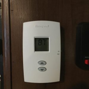 New Thermostat.

I had to use the batteries..  Tested hooking it up with just 12VDC, it didn't turn on.  Using the batteries, it turns on and controls