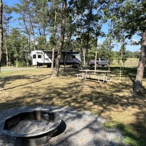 Between sites.  If you look beyond my friends camper you can see a field where we walked our dogs.