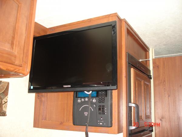 24 inch flat panel on swing arm with entertainment center