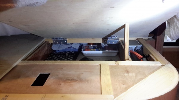 30 x 20 x 6 shoe storage under bed.  Cut out on left reveals water tank level.