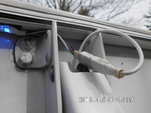 Awning LED plugged in with white shrink tube on connection