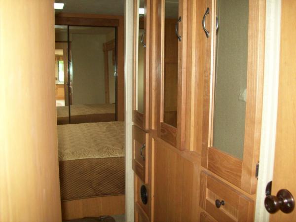 bathroom wardrobe, view into bedroom with mirror closet