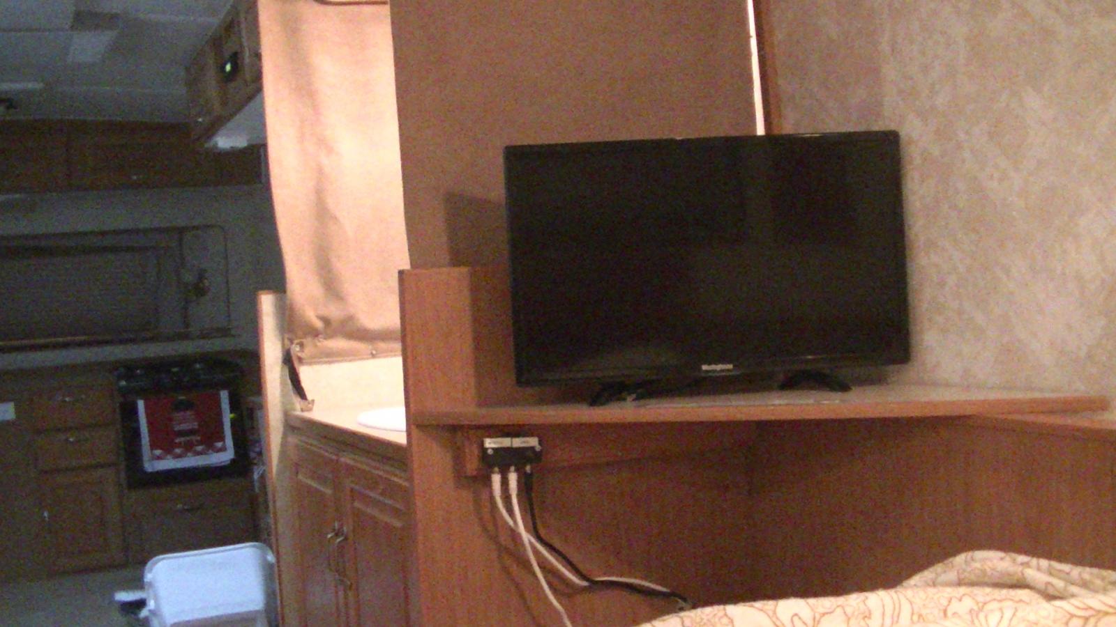 bedroom tv on shelf