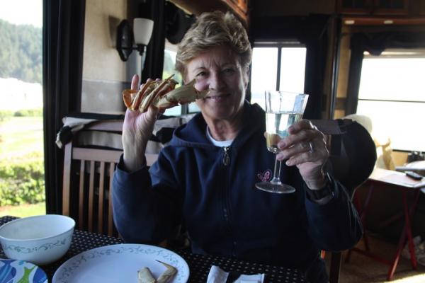 Betty enjoying FRESH Dungenous Crab on our Anniversary in Coos Bay, OR.