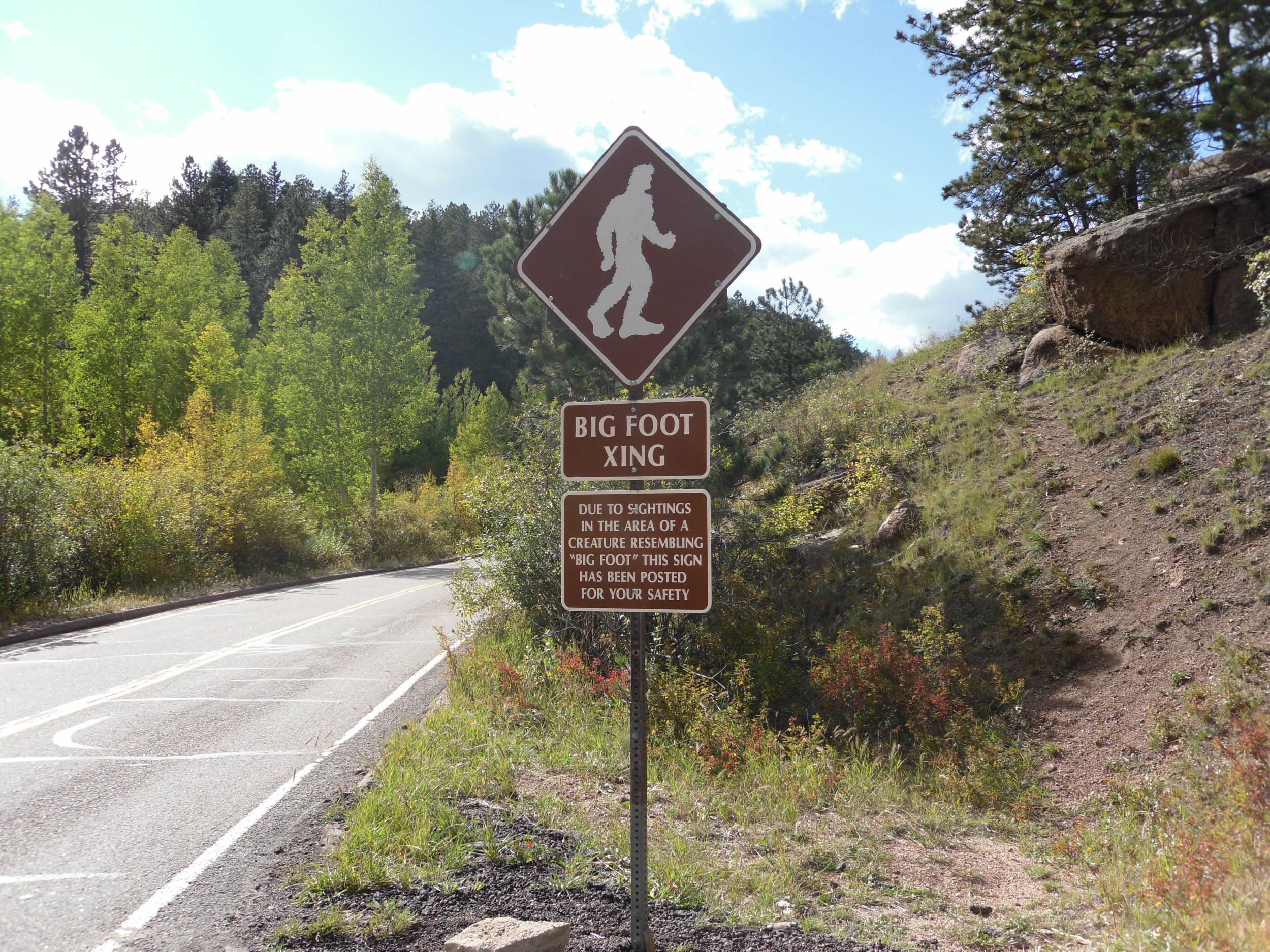 Bigfoot Crossing Sign Going Up Pikes Peak Hwy.