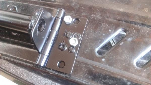 Bolted thru existing slots in step so that I did not have to drill any holes in the step.