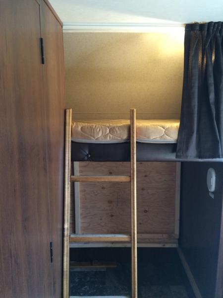 Bunk ladder and cut the full length privacy curtain. Will add the other piece later for the bottom bunk.