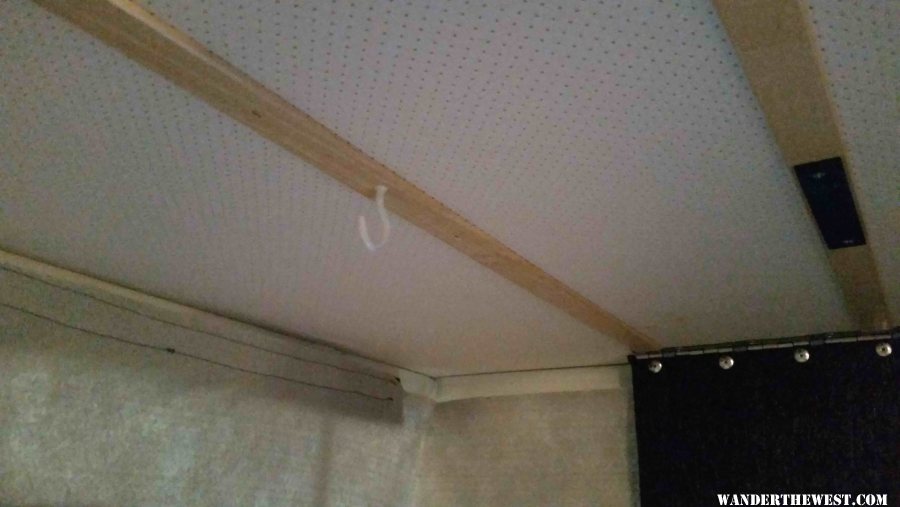 Coat hook in ceiling