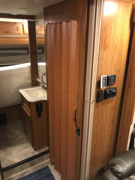 Doesn’t help the value or curb appeal of the RV but with this cheap vinyl door for the bathroom we can finally cut off the entire back half of RV when