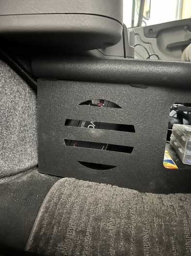 Door speaker amp in center console