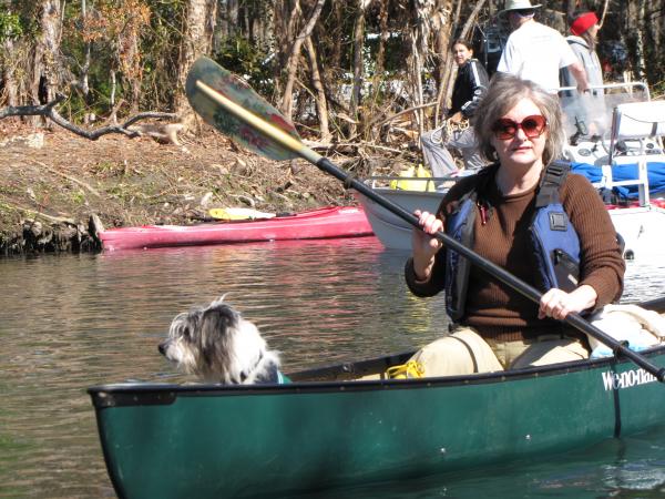 DW and her dog on the river.