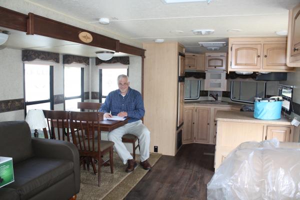 Enjoying the pre-delivery inspection of our new Windjammer.  Notice the involuntary smile! (5/8/2012)