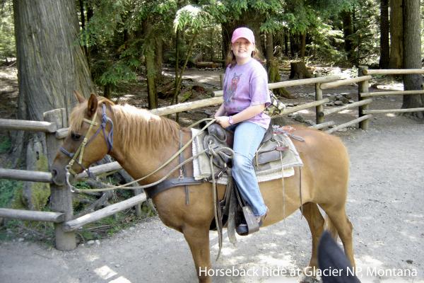 Erica on horseback at Glacier NP.