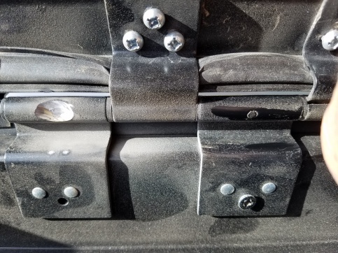 Friction Hinge with one pin intact the other ground off.