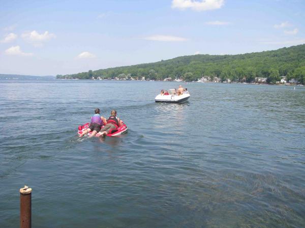 Friends and family tubing on Lake Conesus, south of Rochester N.Y.