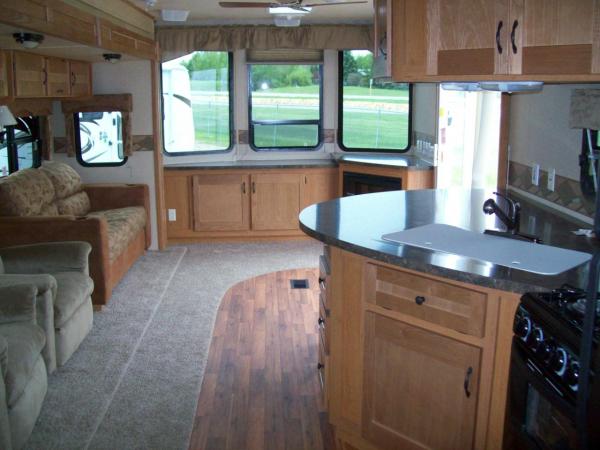 Front bay windows w/hutch, and kitchen area