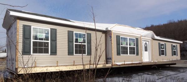 Front section of house as it sits on builder's lot waiting until the basement is completed so it can be set.