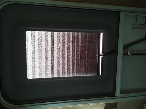 I added this blind on the inside of the new door window for privacy.  Pretty simple install.