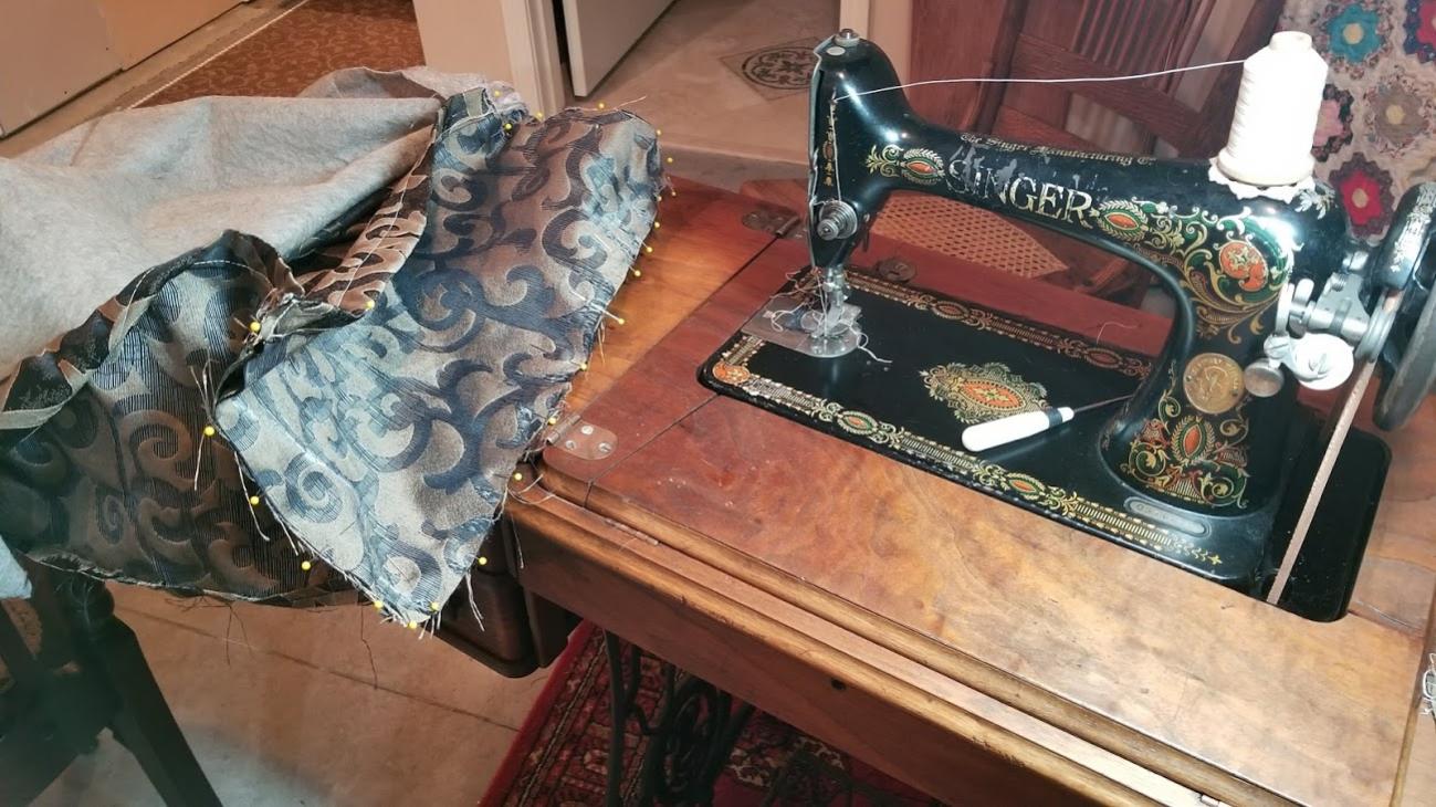 I used my grandmother's treadle to reupholster the sofa.