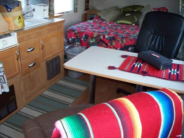 Inside former trailer - removed the dinette benches as they took up too much room and didn't work for us.