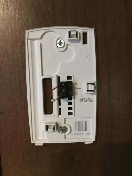 Installing new thermostat.