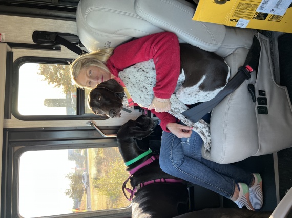 Kathy and a couple of the pups enjoying the ride!