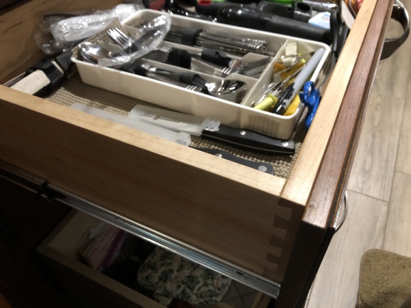 Kitchen drawers 1:  Replaced original drawer boxes with solid maple with dovetail joints.