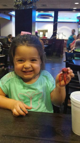 Kyleigh holding crawfish