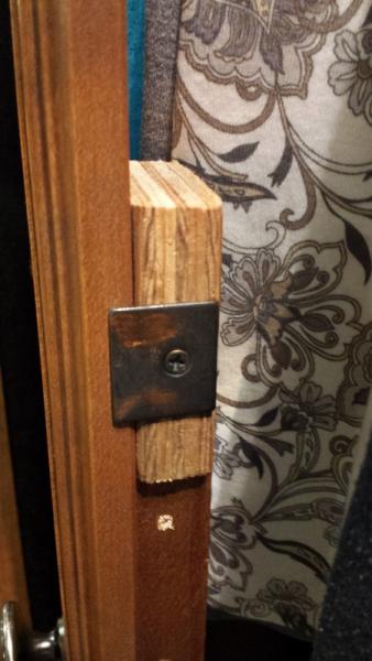 Left closet door magnet plate. Notice we had to add a small block of wood to mount it on the left door only.