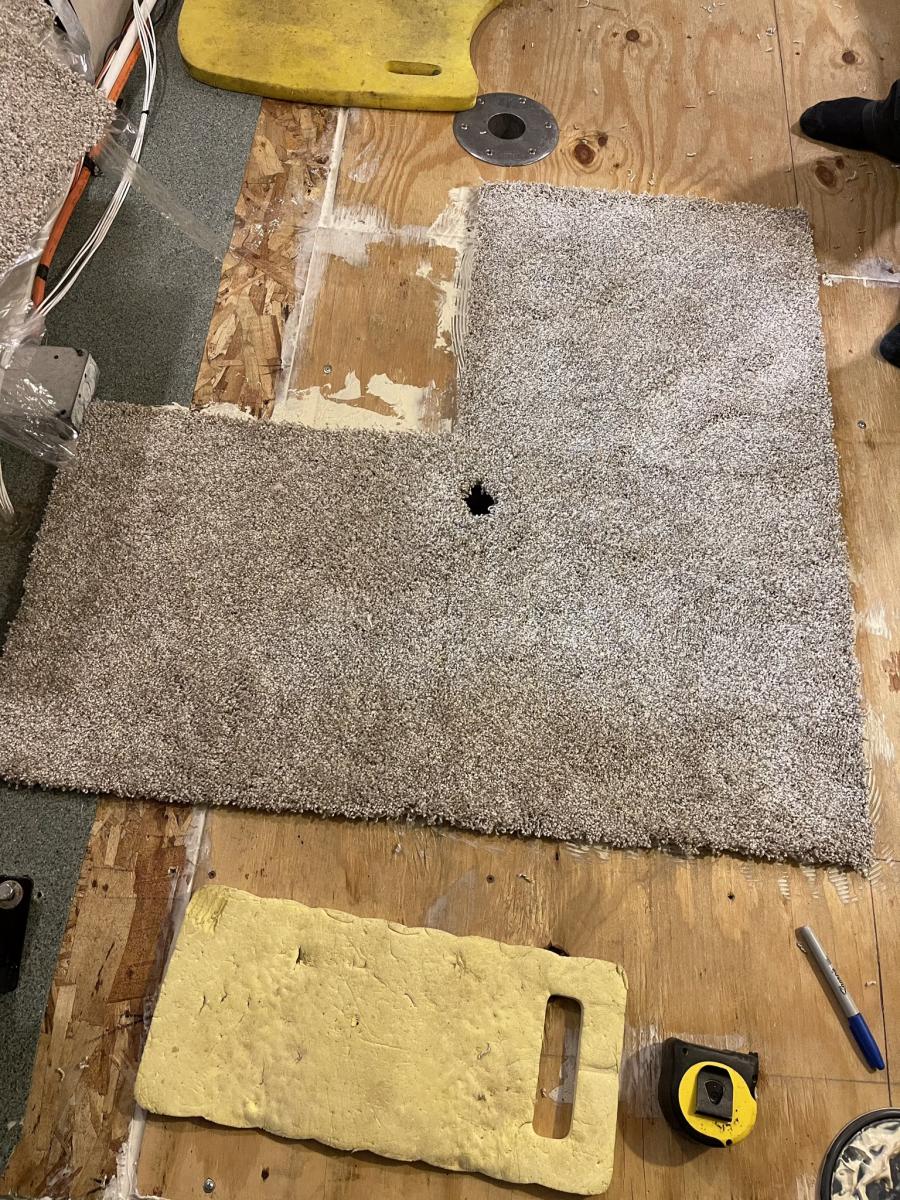 Making a start with the carpet tiles