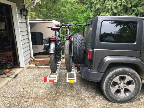 Modified Black Widow dual motorcycle rack to squeeze the bikes closer to the Jeep, and closer to each other. Reduced the rear hang distance by about 1