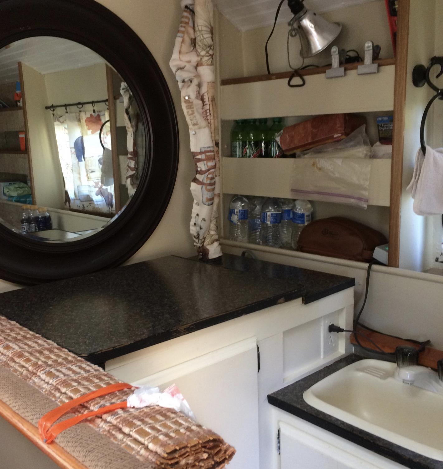 new mirror, top of wardrobe, sink