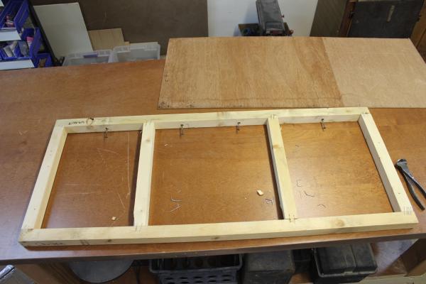 Other than cutting drawer holes in the front paneling, this is the only piece that had to be rebuilt.  It is the front frame under the foot of the bed