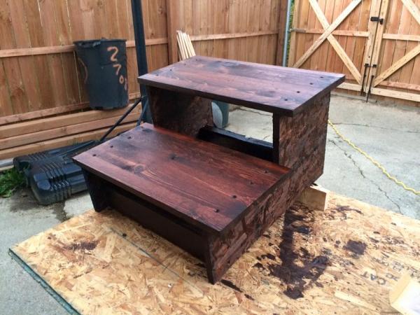 Our old dogs had trouble navigating the metal step on the travel trailer so I made a set of large tread wooden steps.