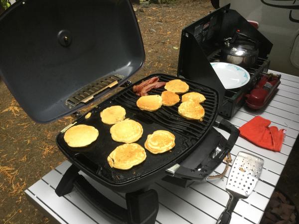 Pancakes and bacon on the BBQ. Not perfect yet, but will get better with practice.