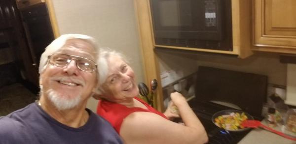 Paul and Marilee enjoying breakfast in Stormy the RV