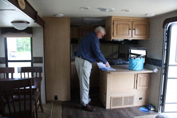 Pre-delivery inspection on our first TT.  "Visiting" our Windjammer 3008W on the dealer's lot 10 days before delivery. (5/8/2012)