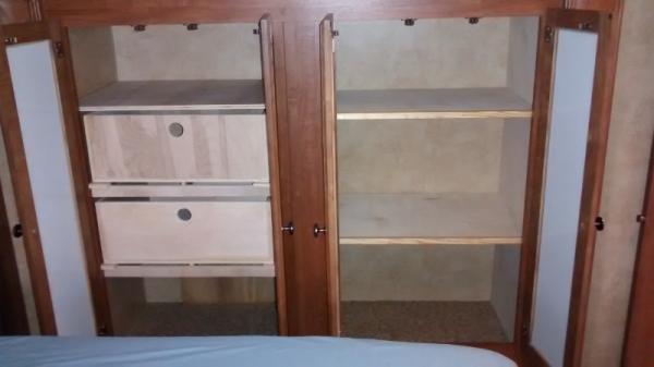 Remodeled bedroom closet.  Replaced closet rods with shelves and drawers. (800x449)