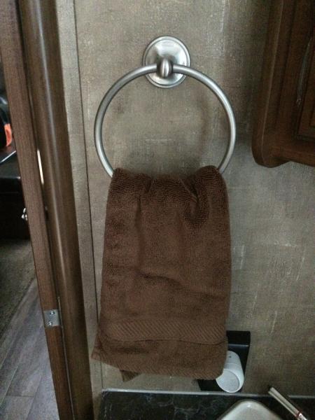 Replaced cheesy bathroom hand towel hook with a nice towel ring.