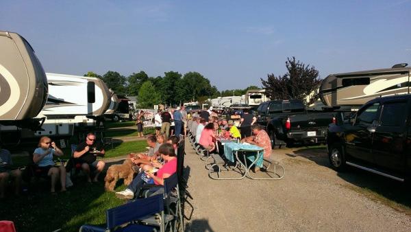 Saturday Night Pot-luck (photo 3) - Everyone enjoying themselves on Buggy Lane at Shipshewana South Campground.