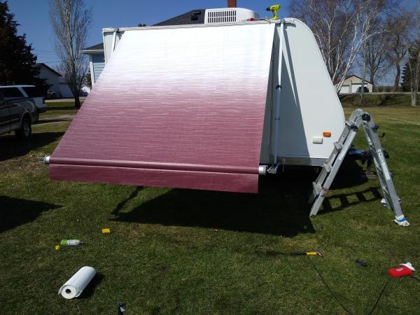 Score! Burgundy fade awning for the wee house on wheels. Found on eBay for $75. Easy install!