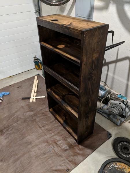 Shelf for bathroom. Hole in the top was to get the bottom screw in for the medicine cabinet.