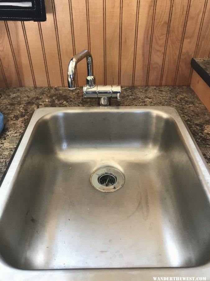 sink and cold water faucet